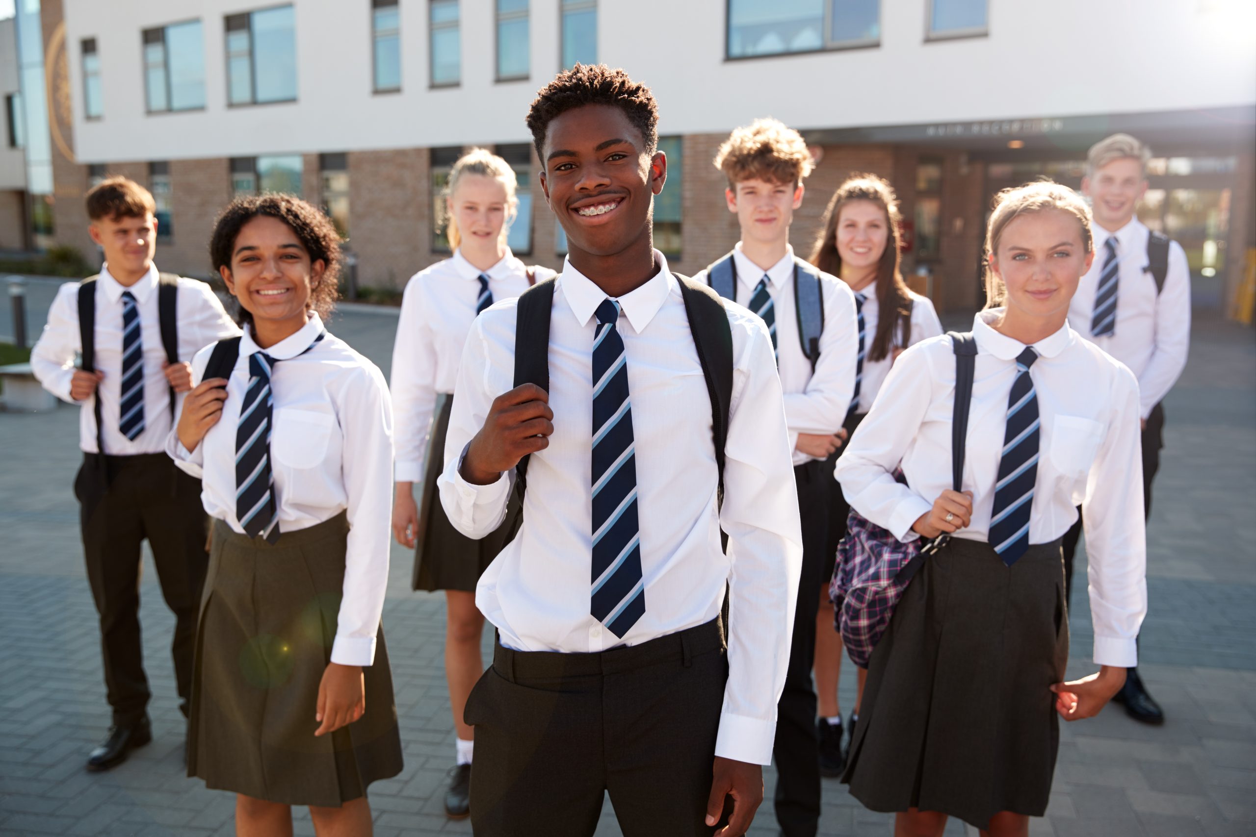 Portrait,Of,Smiling,Male,And,Female,High,School,Students,Wearing